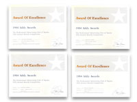 four certificates with the words award of excellence