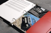 a binder with a picture of a car on it