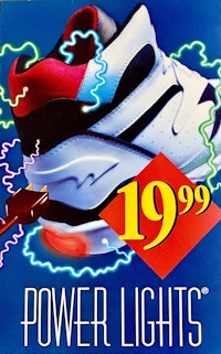 an advertisement for a pair of sneakers with power lights