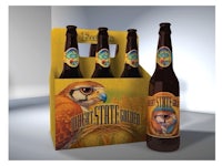 a bottle of beer with an owl on it