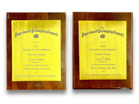 two wooden plaques with a yellow label on them